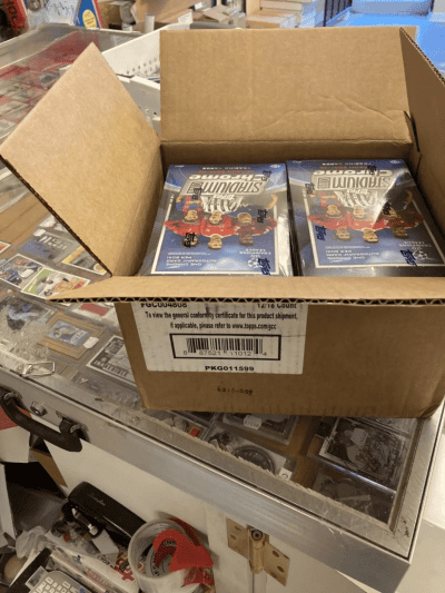 Open box with Topps Stadium Club Chrome UEFA Champions League cards inside.